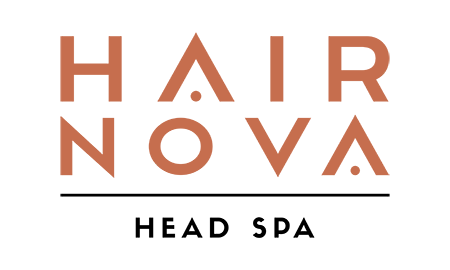 A black background with the words hair nova written in orange.
